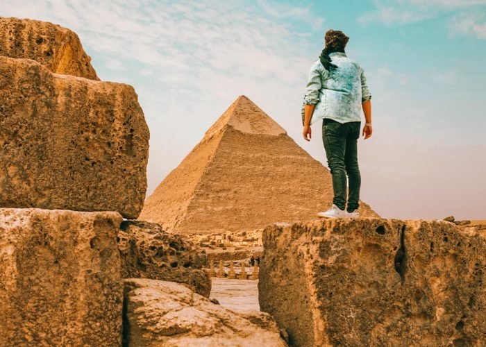 Tourist-man-standing-in-front-of-the-pyramid-of-Khafre