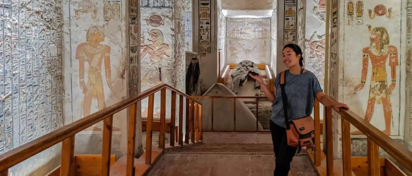 A-tourist-visiting-ancient-egyptian-tomb-luxor-travel-guide