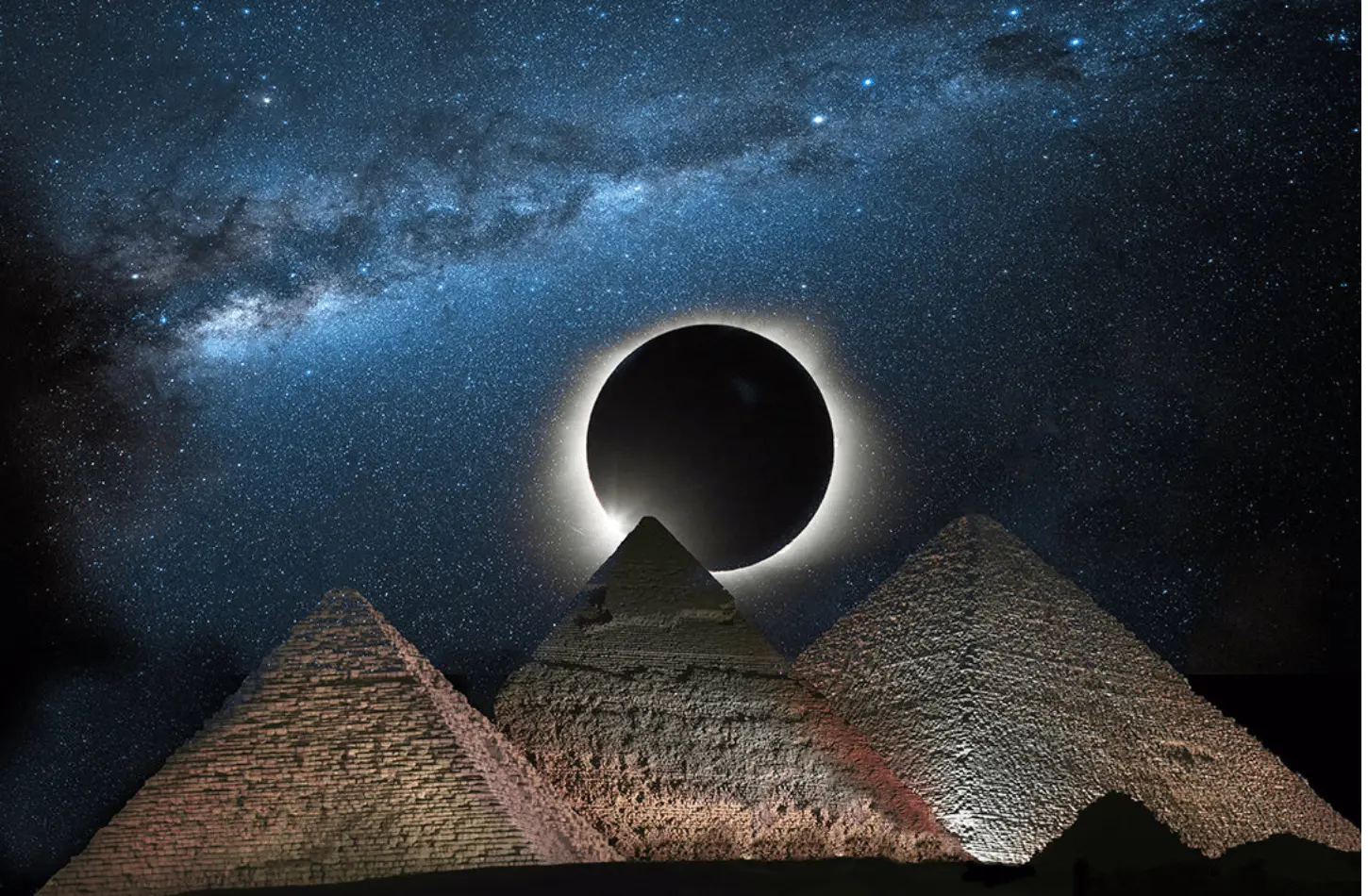 A total solar eclipse showing a dramatic ring of fire effect through dark clouds in the Egyptian sky
