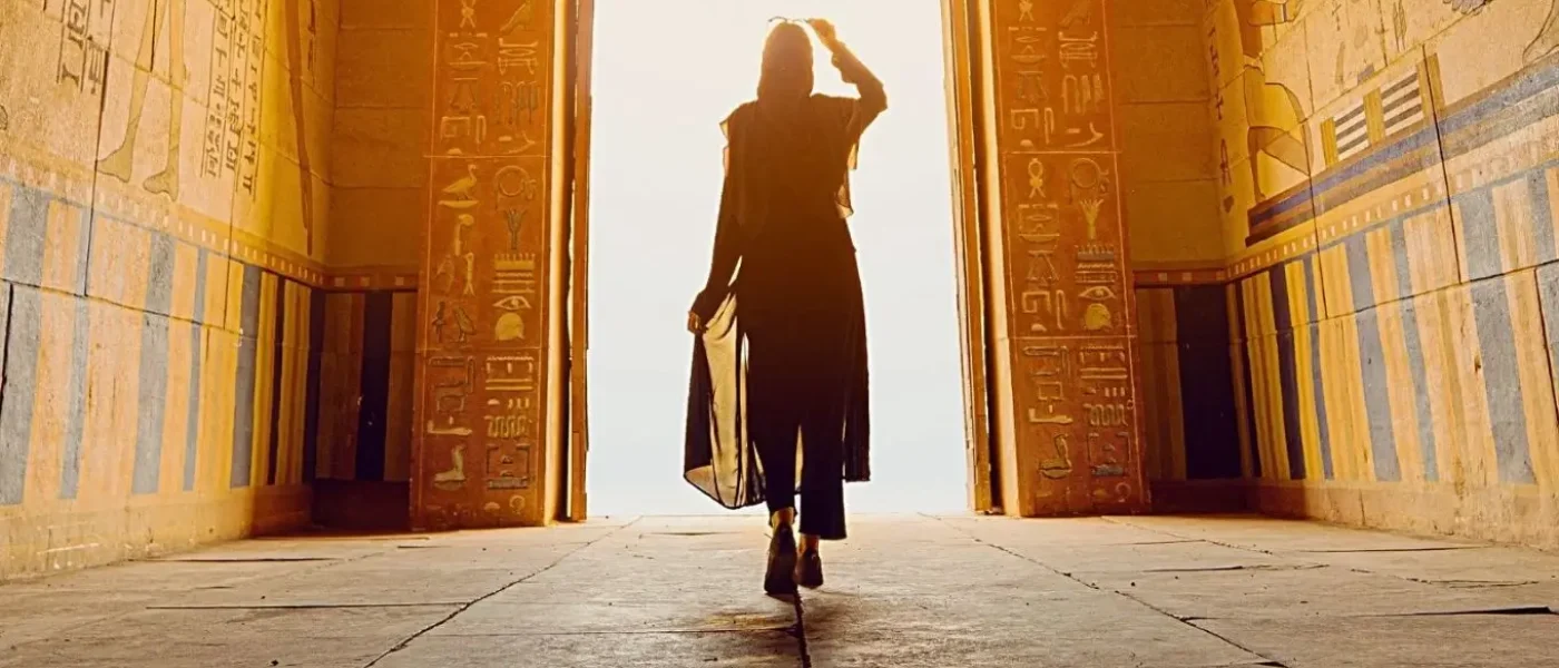 woman-traveler-ancient-egyptian-temple-entrance